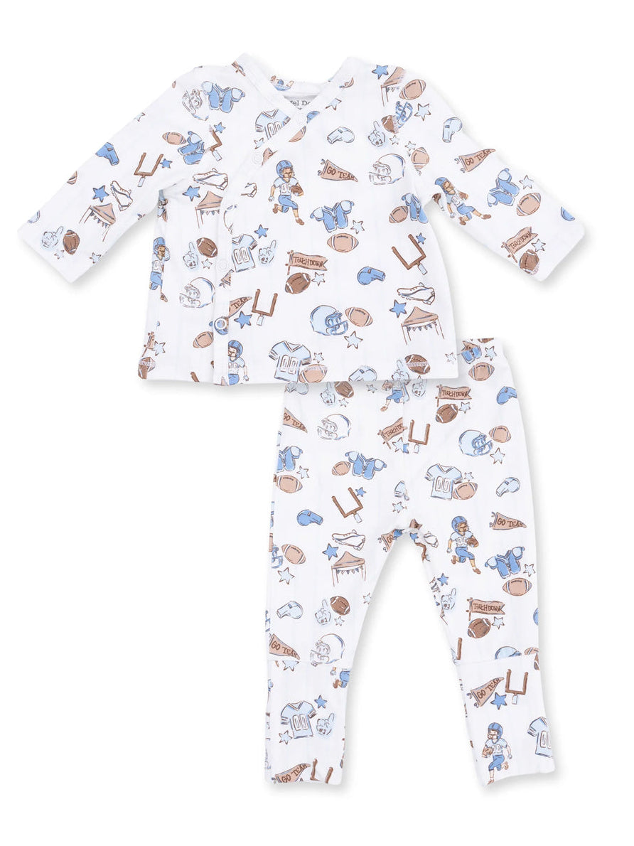 Cute children's pajama set with blue and brown sports-themed patterns on a white background. 