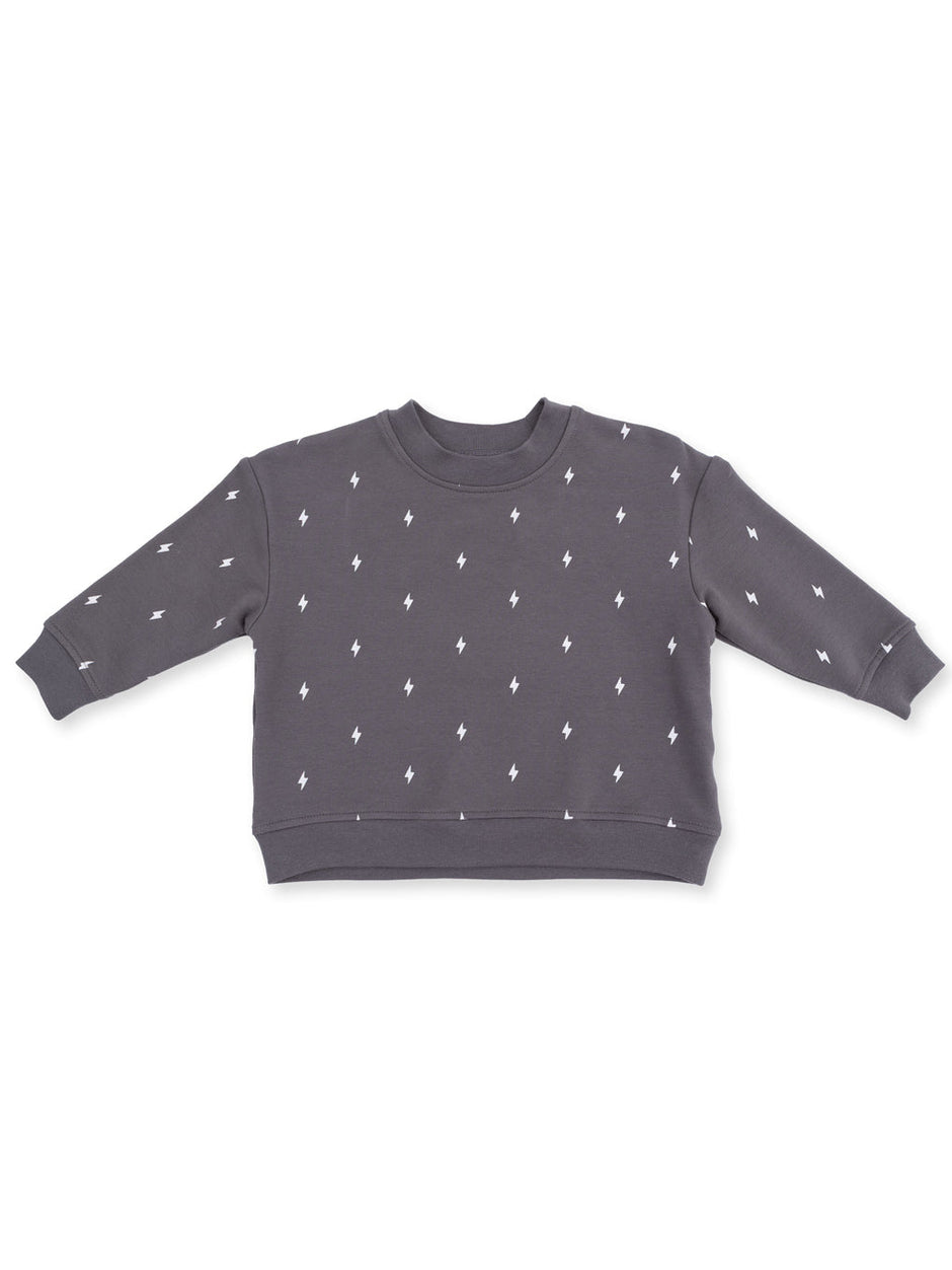 Gray cropped sweatshirt with white lightning bolt patterns on the front, featuring long sleeves and a round neckline.