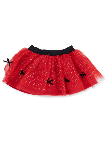 Red tulle skirt with black waistband and decorative bows, featuring gold polka dots throughout.