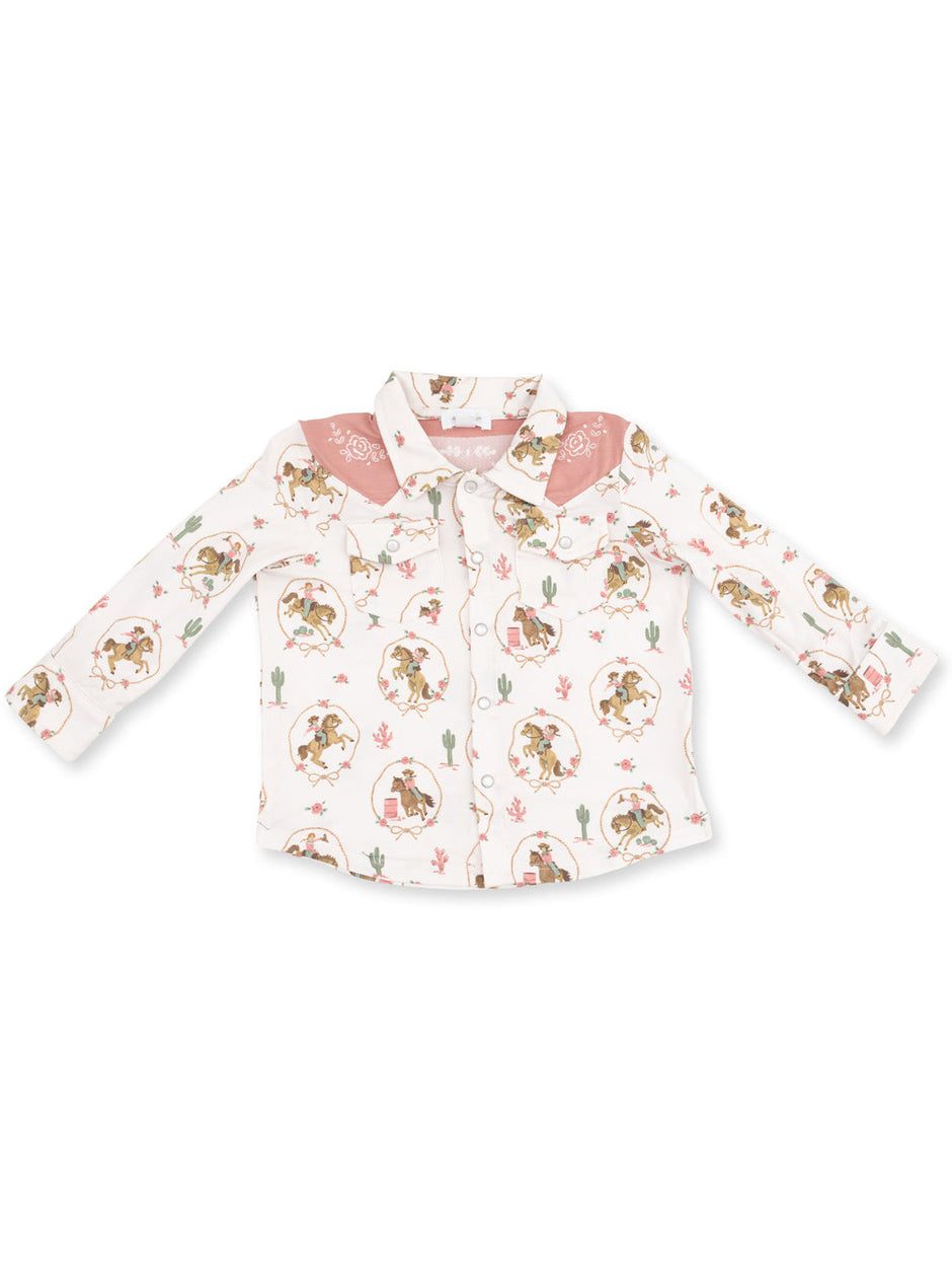 Child's western-style shirt with colorful cowboy print and pink yoke detail. Long sleeves, button-up front.