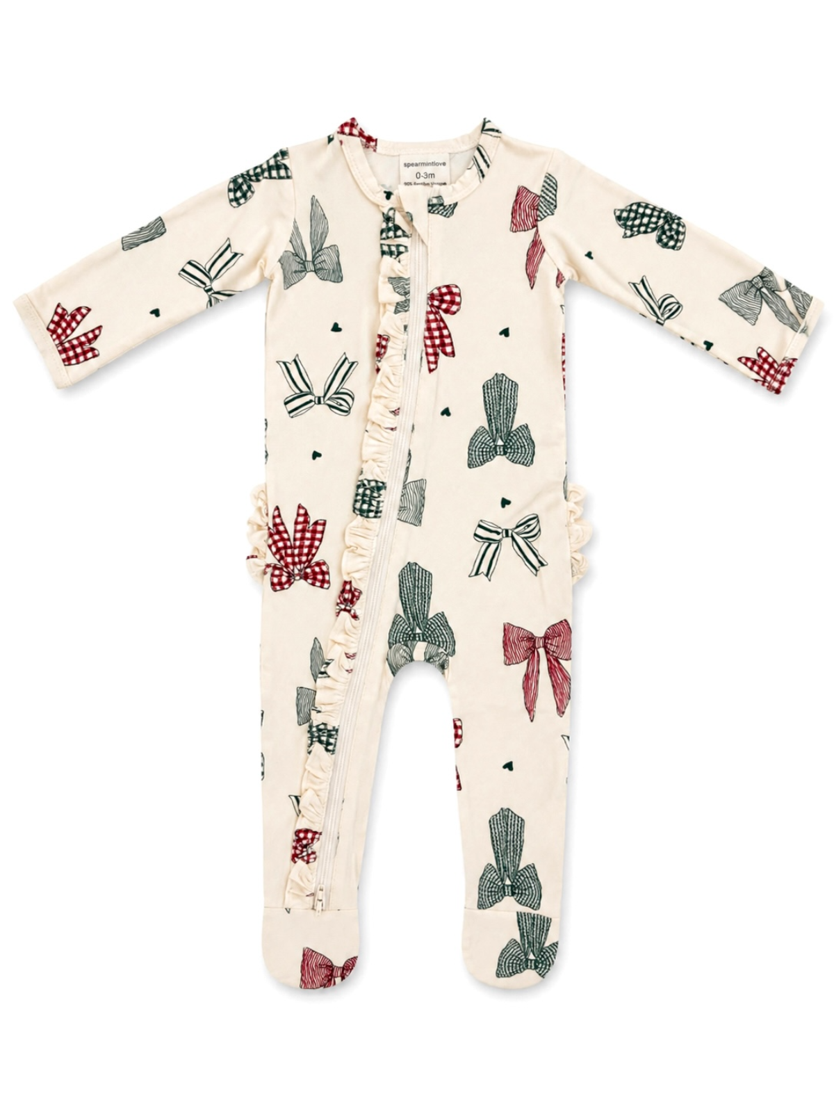 Cream-colored onesie with bow patterns and ruffles, suitable for infants.