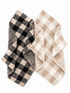 Two checkered blankets, one in black and beige, the other in cream and tan, layered together.