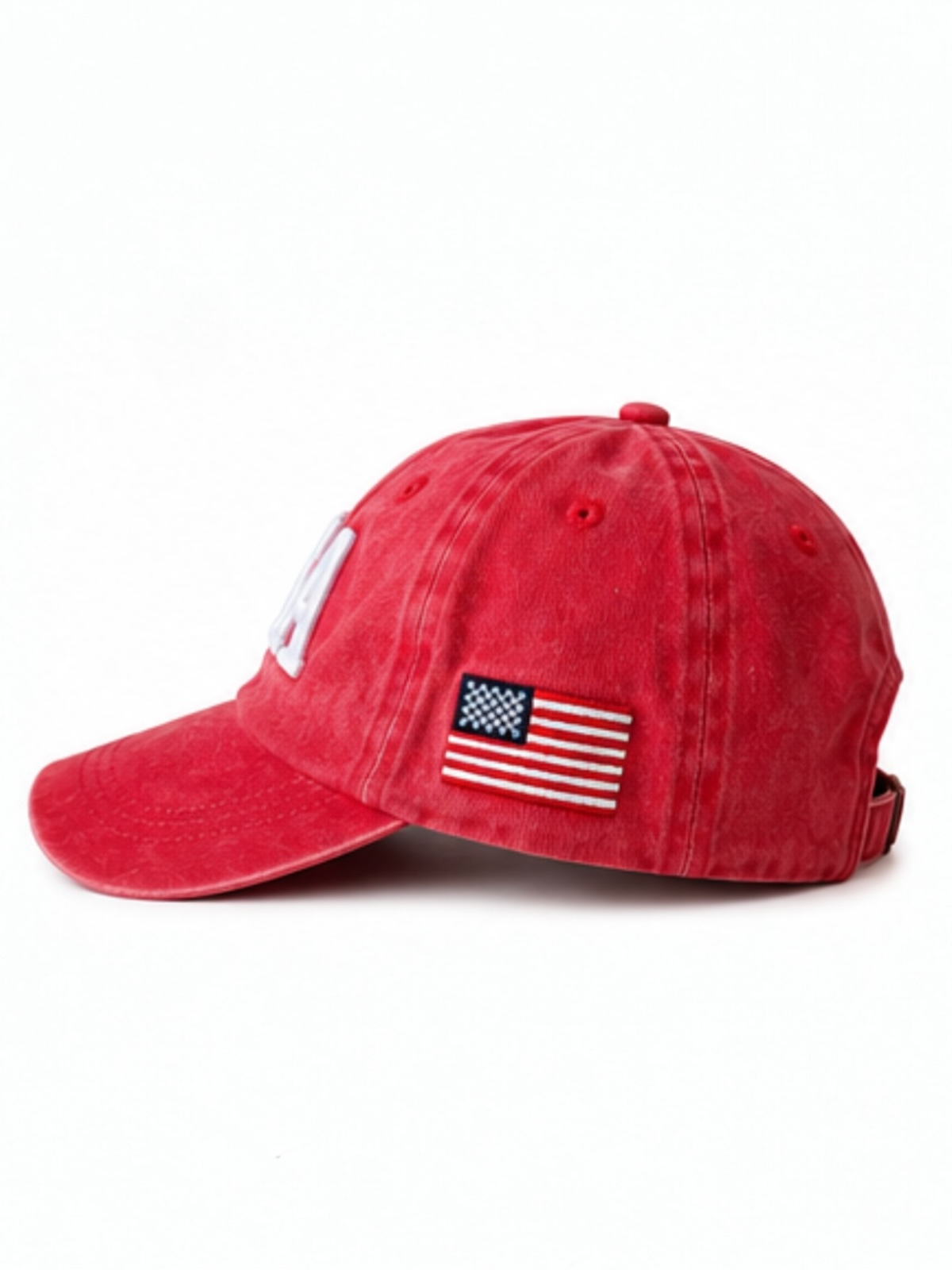 Red baseball cap featuring an embroidered American flag on the side.