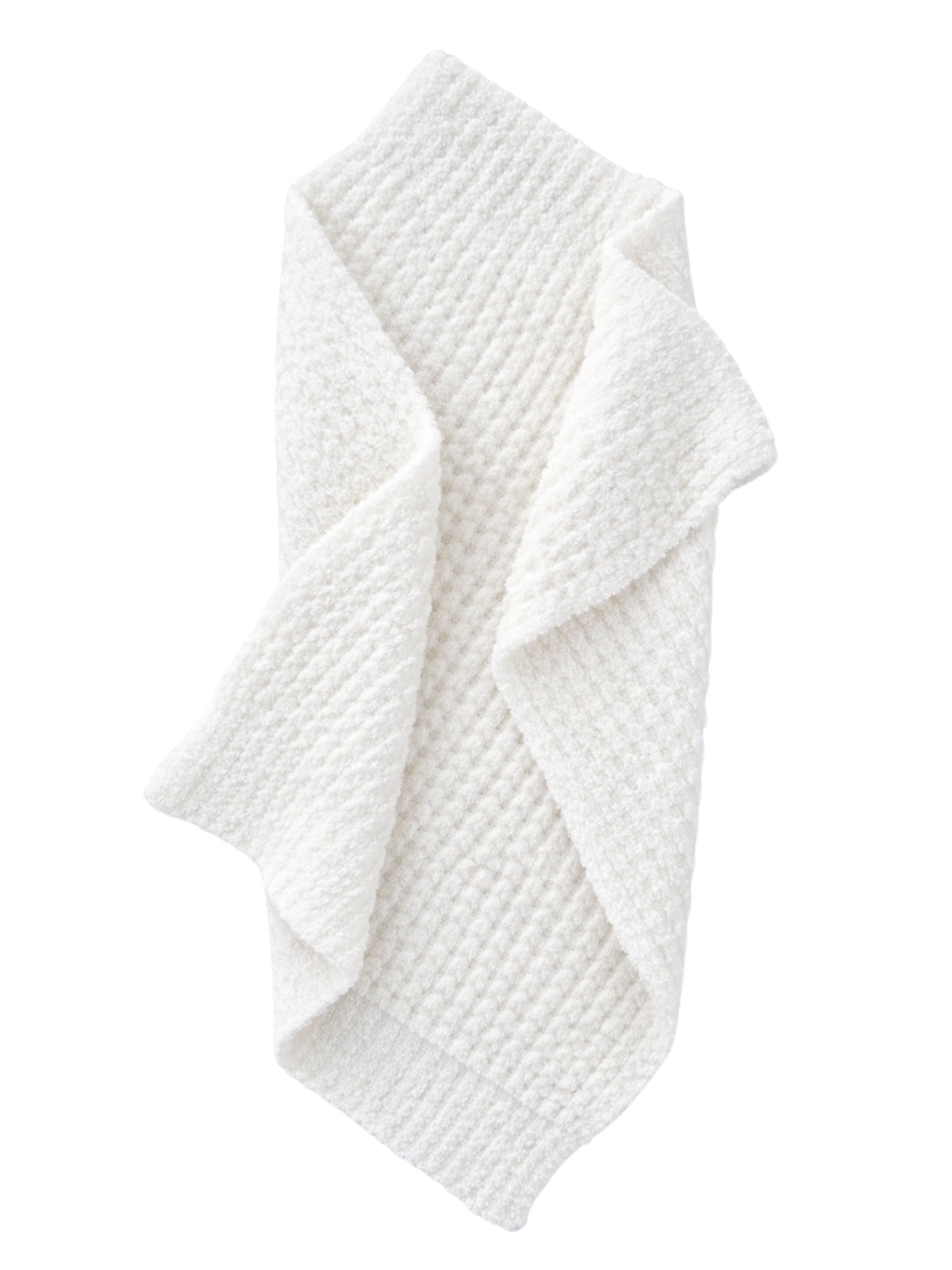 Textured white blanket draped elegantly, showcasing its cozy and soft appearance.