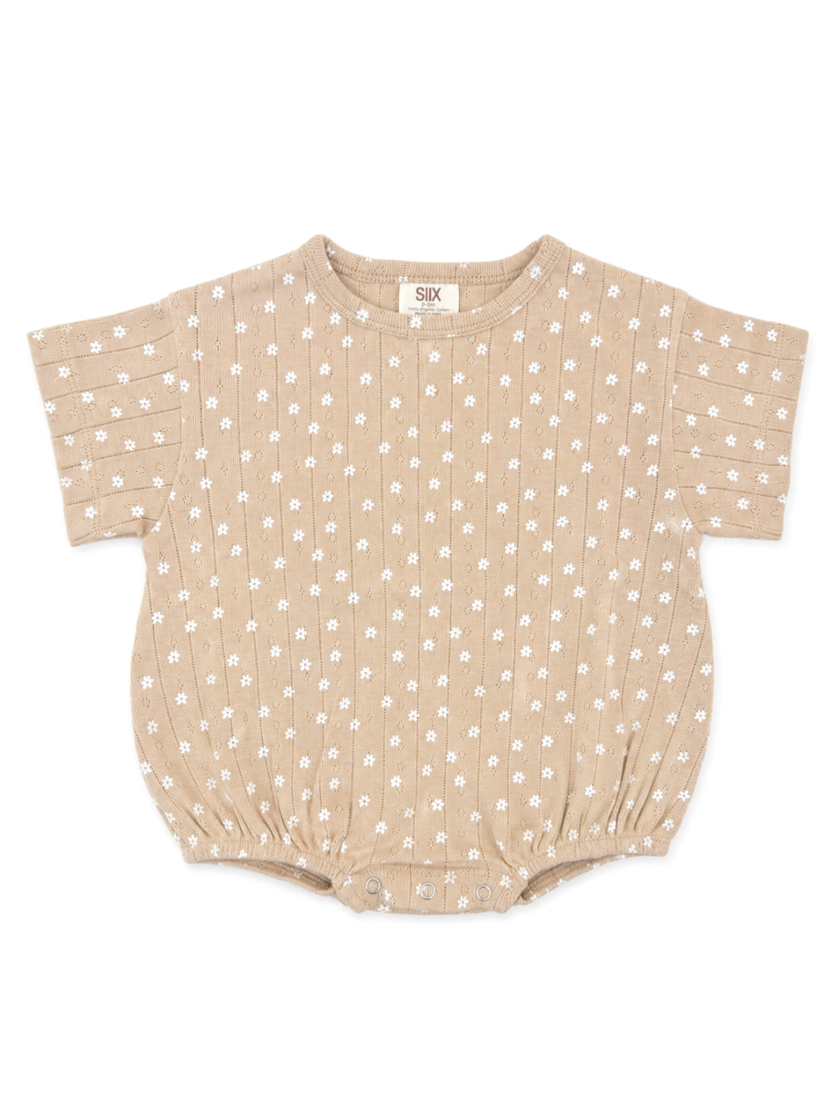 Tan baby romper with white floral print and short sleeves, featuring gathered bottom and snap closures.