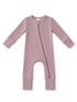Light mauve baby onesie with long sleeves and a front zipper, featuring ribbed texture.