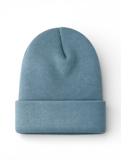 Light blue knit beanie hat, folded at the bottom, displayed on a white background.