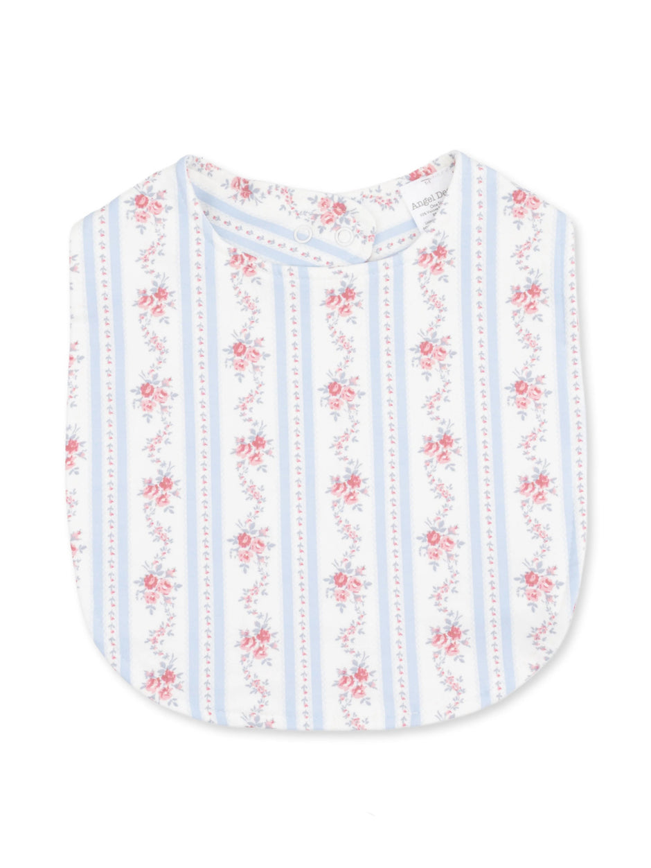 Floral-patterned baby bib with pastel colors and button closure, featuring a blue and white striped design.