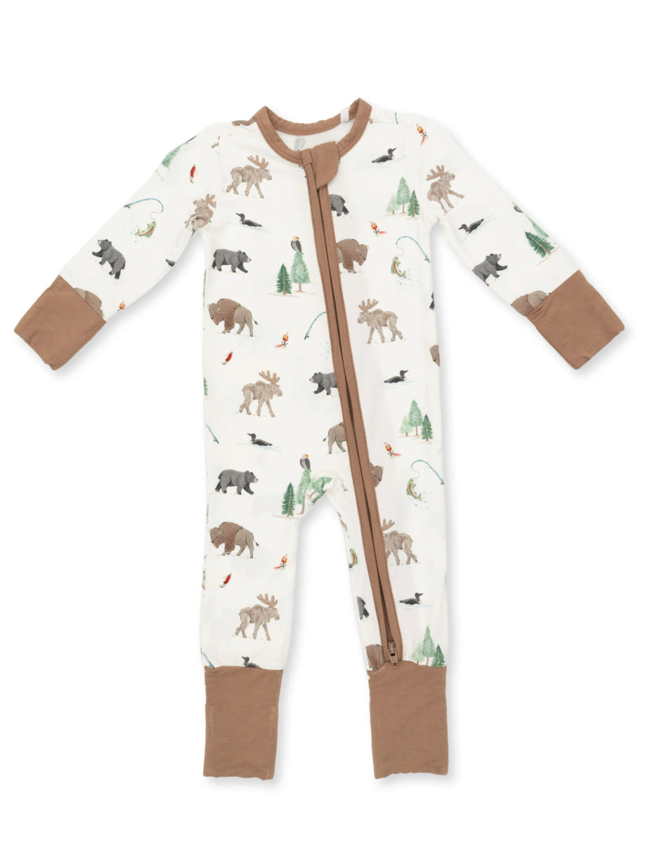 Baby pajama onesie featuring woodland animal prints with a front zipper and brown accents. Ideal for cozy nights.
