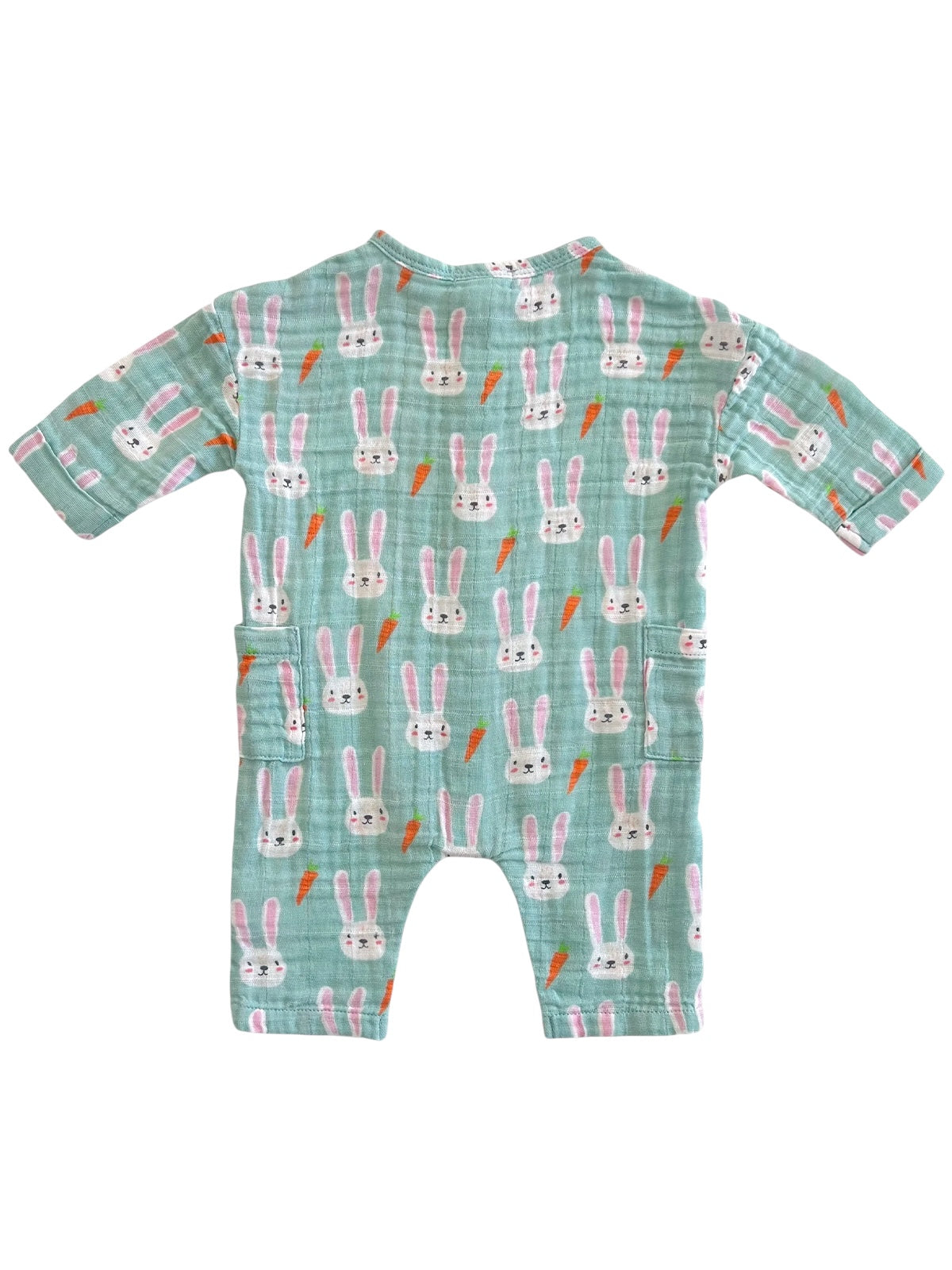A cute children's romper with a bunny and carrot pattern on a mint green background.