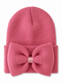 Pink knit beanie with a large bow accent on the front.