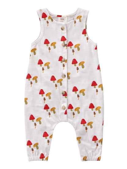 White baby romper with mushroom print, featuring red and brown mushrooms and buttons down the front.