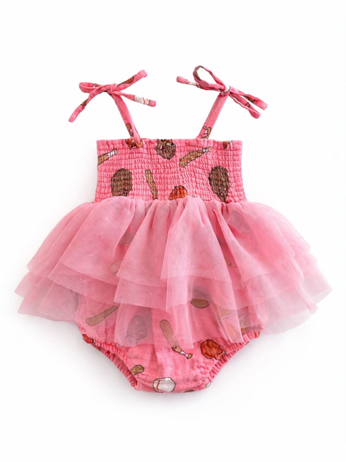 Light pink baby dress with tulle layers and playful food prints, featuring adjustable straps. Perfect for warm weather.