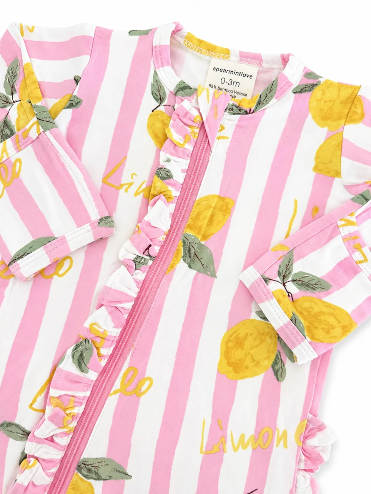 Pink and white striped baby romper with lemon pattern and ruffled zipper design. Ideal for infants 0-3 months.