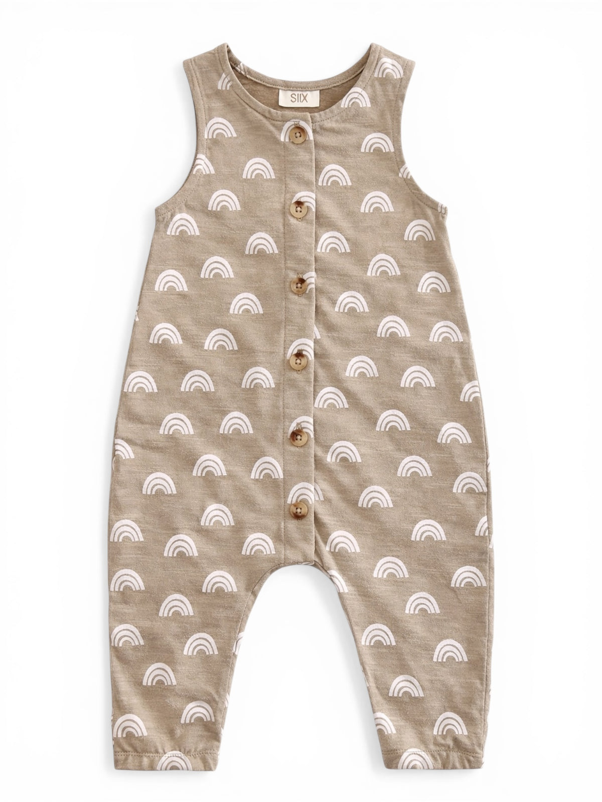 Tan romper with white rainbow patterns and wooden buttons, designed for infants.