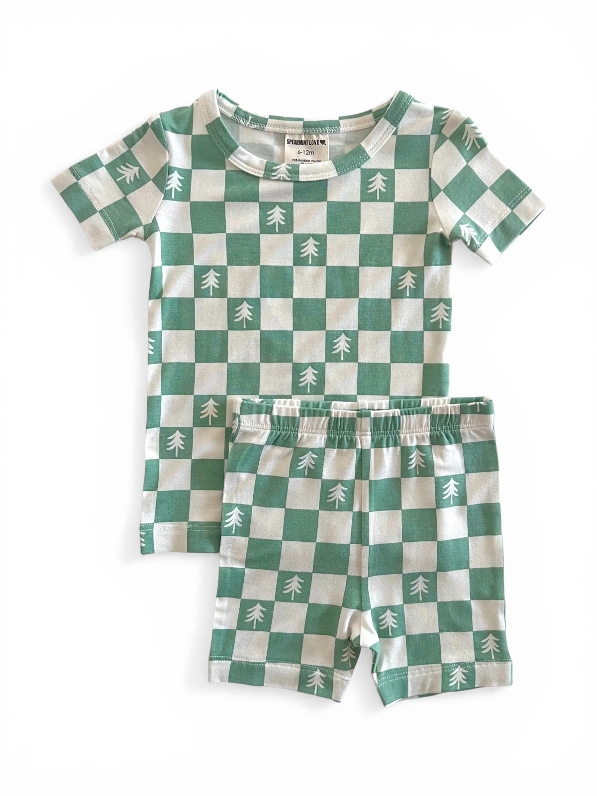 Green and white checkered pajama set featuring trees, includes a short-sleeve shirt and shorts.