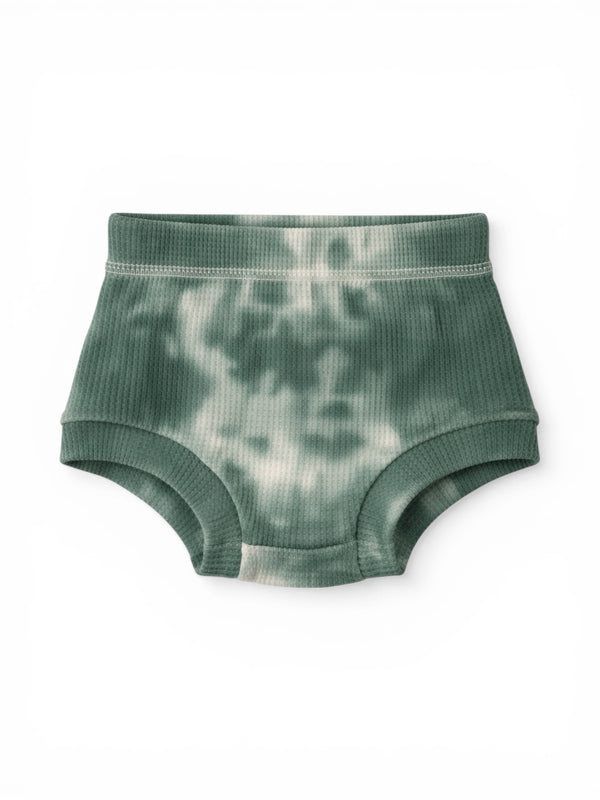 Green tie-dye baby shorts on a white background. Soft ribbed texture, classic design for comfort.