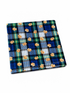 Colorful plaid fabric featuring teddy bear illustrations on a blue and green background.