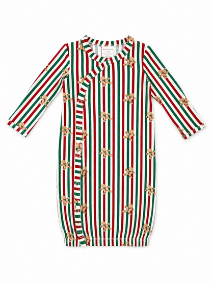 Baby outfit featuring red, green, and white stripes with gingerbread man prints, designed for ages 0-3 months.