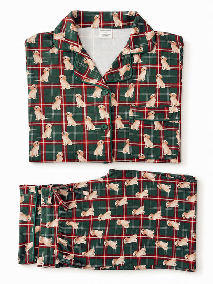 Green plaid pajamas featuring playful golden retriever dog patterns. Perfect for cozy nights.