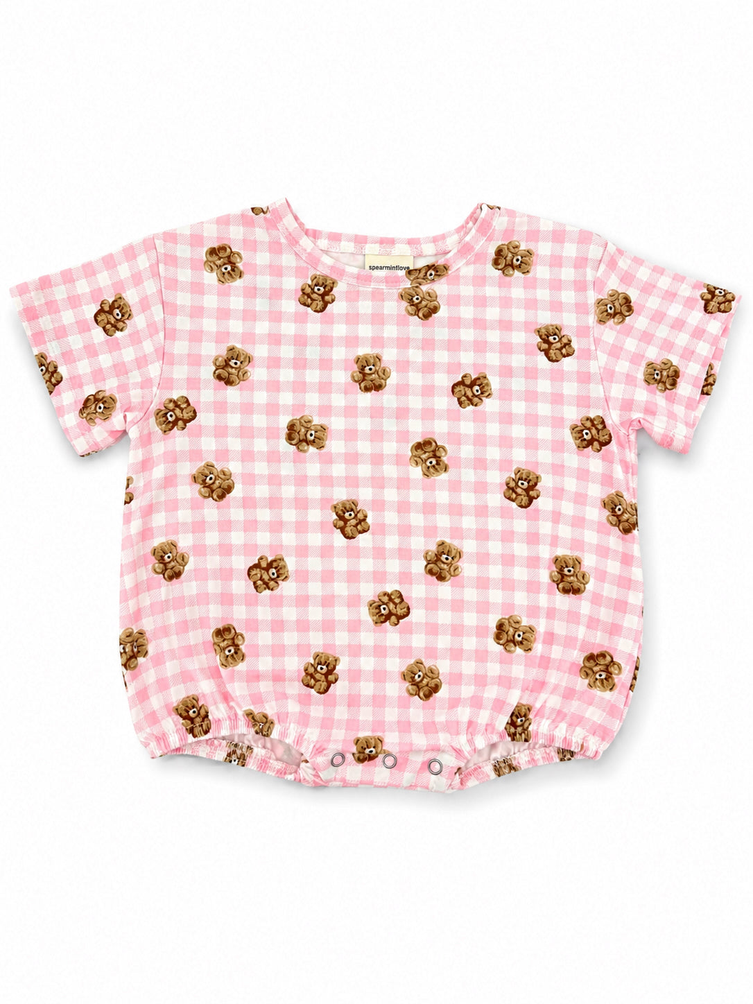 Light pink short-sleeve shirt with teddy bear print and checkered pattern. Perfect for casual children's wear.