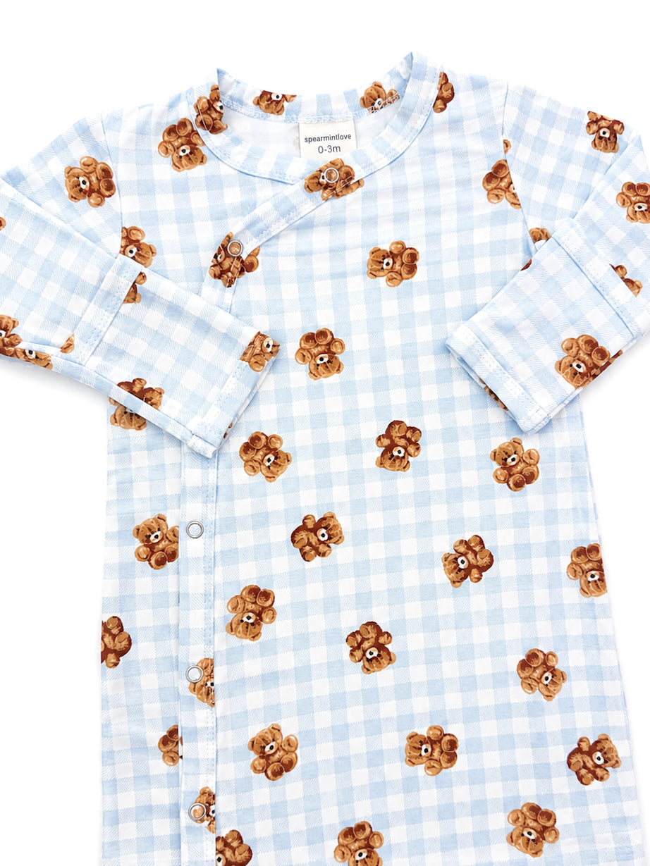 Light blue checkered baby onesie with teddy bear prints, designed for ages 0-3 months.