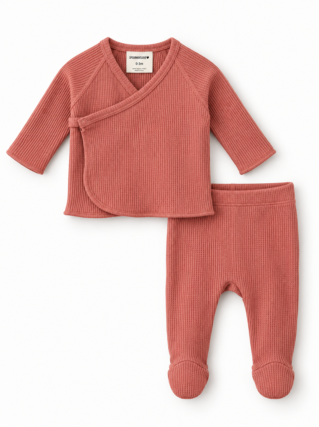 Light pink baby outfit featuring a long-sleeve wrap top and matching footed pants. Perfect for newborns.