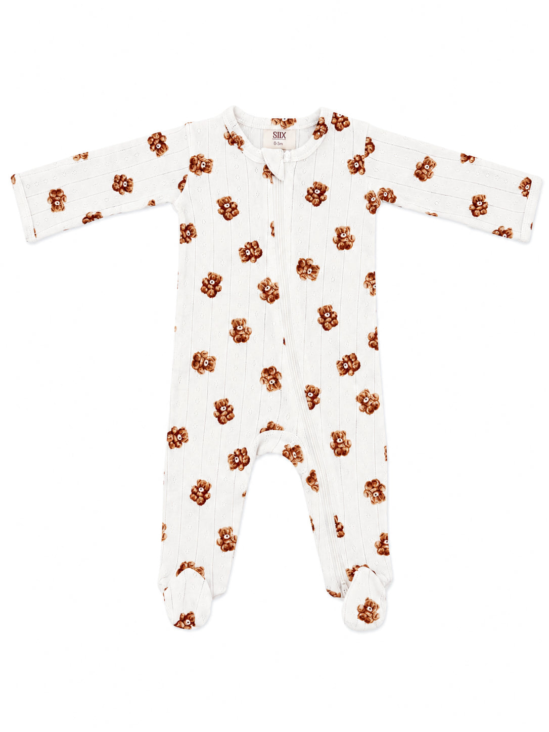 White baby sleeper with brown teddy bear print, featuring full sleeves and footed design.