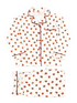 Patterned white pajama set featuring red trim and floral designs, laid flat on a white background.