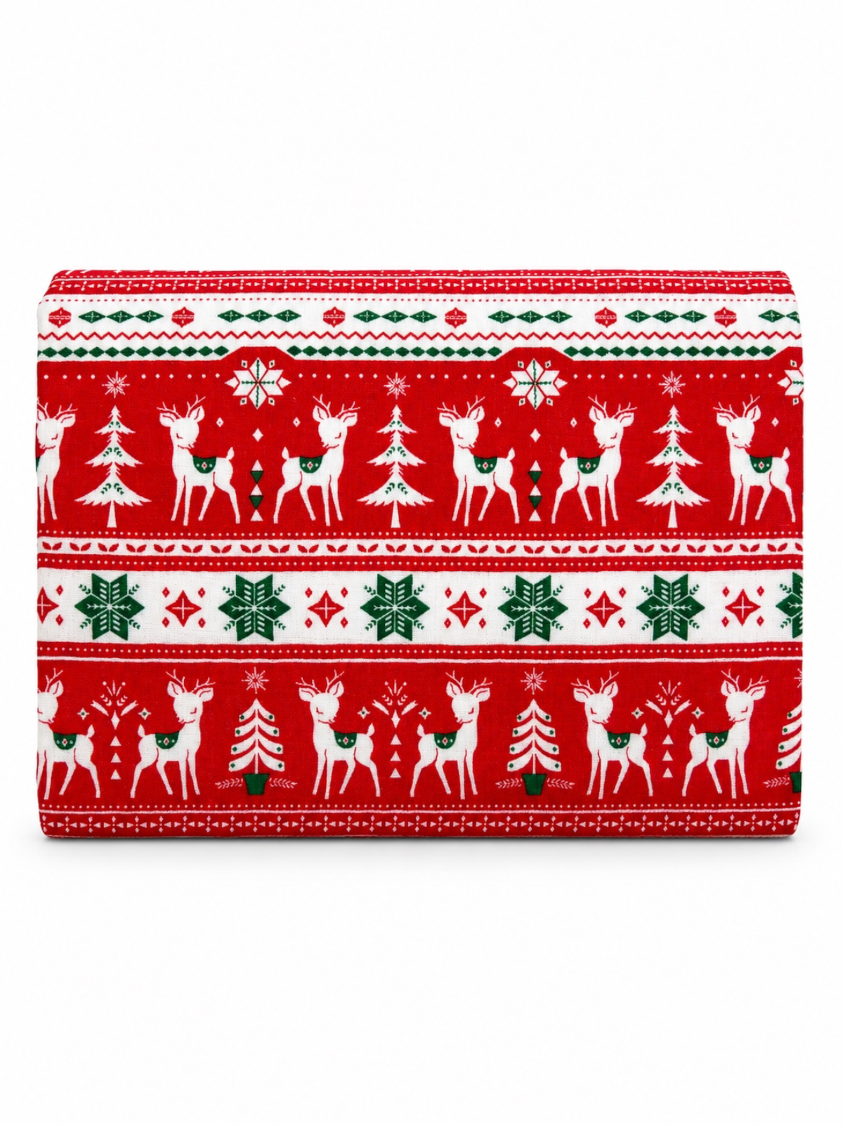 Red holiday fabric featuring white reindeer, green trees, and snowflakes in festive patterns.