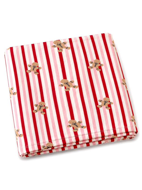 Red and white striped blanket featuring cute gingerbread cookie patterns. Cozy and festive design.