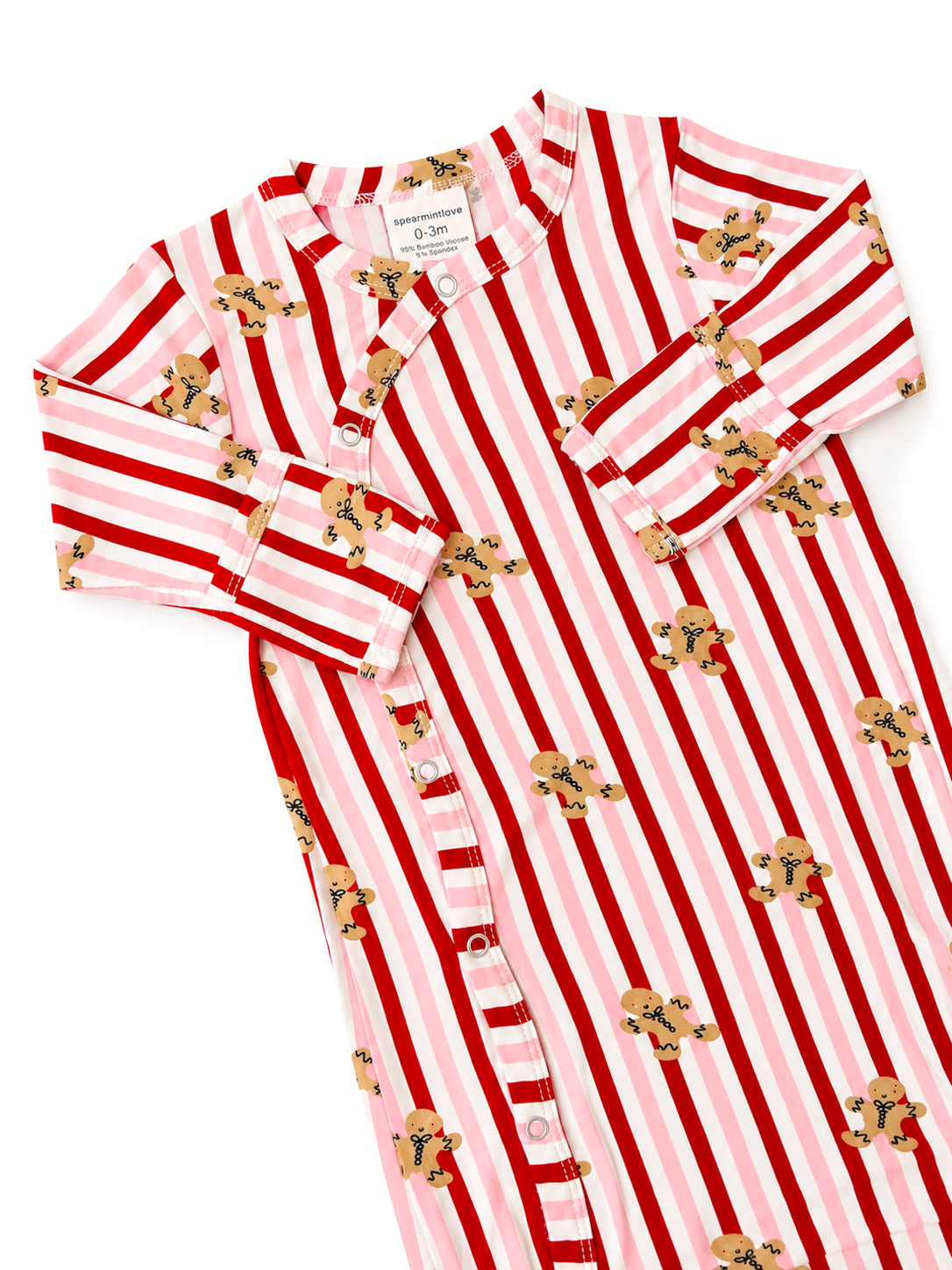 Red and pink striped baby sleepwear with gingerbread patterns, suitable for 0-3 months.