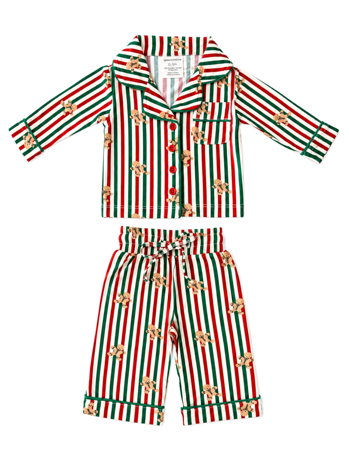 Red and green striped children's pajamas with gingerbread patterns. Includes a button-up top and matching pants.