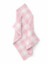 Pink checkered towel folded on a white background, featuring a soft, plush texture.