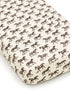 Horse-patterned crib sheet featuring repeated brown silhouettes on a cream background. Ideal for equestrian-themed nurseries.