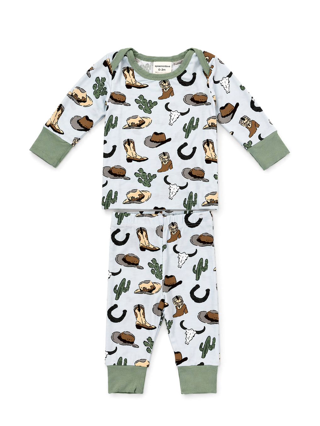 Toddler sleepwear set featuring cowboy-themed patterns: hats, boots, cacti, and skulls on light blue fabric.