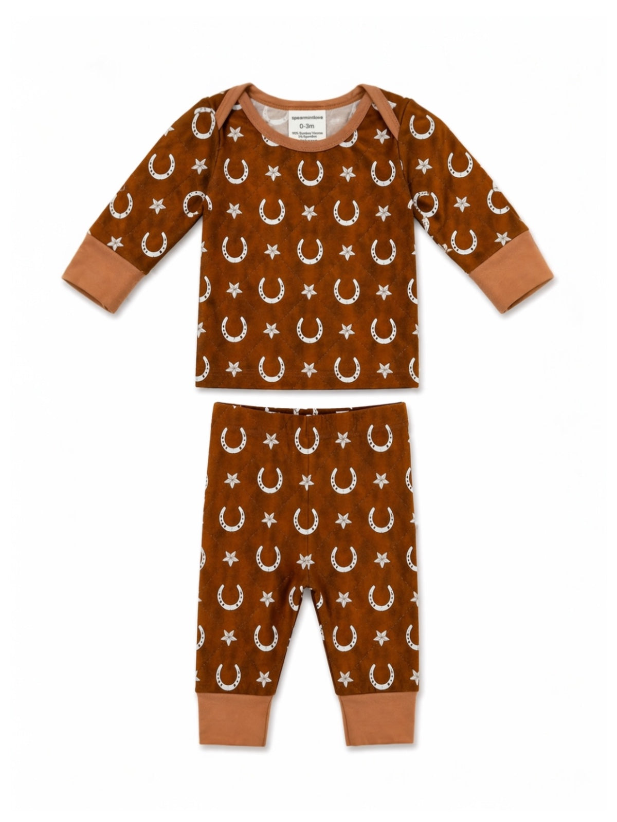 Brown baby pajamas with moon and star patterns, featuring long sleeves and matching pants.