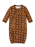Brown infant sleep sack with white star and horseshoe pattern, featuring a round neckline and snap closures.