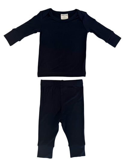 Dark navy blue toddler pajama set featuring long sleeves and pants. Ideal for comfort and warmth during sleep.