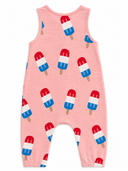 Pink romper with colorful popsicle prints in red, white, and blue patterns. Perfect for summer wear.