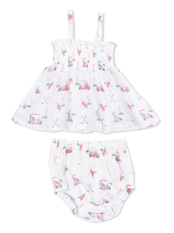 Girls' dress and bloomers set with playful golf-themed prints in pastel colors. Adjustable straps and soft fabric.