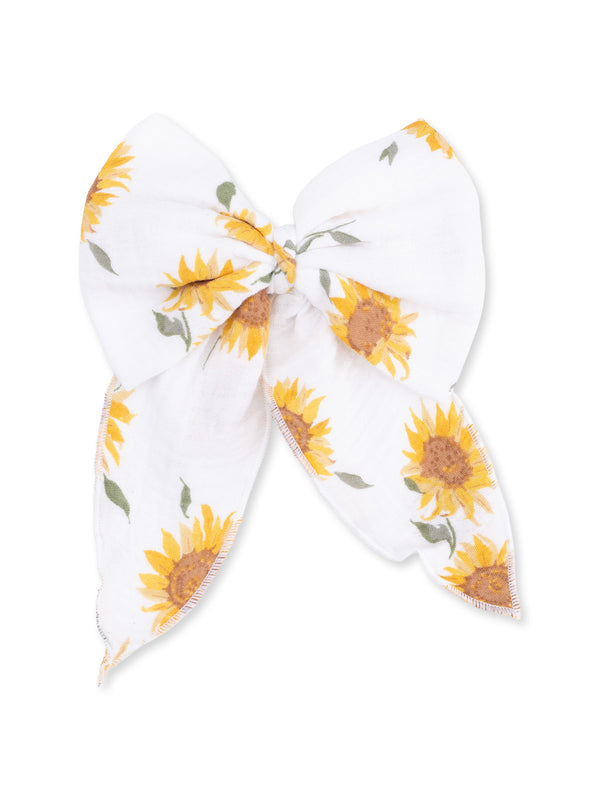 White bow with sunflowers design, perfect for hair accessories or decorative uses.