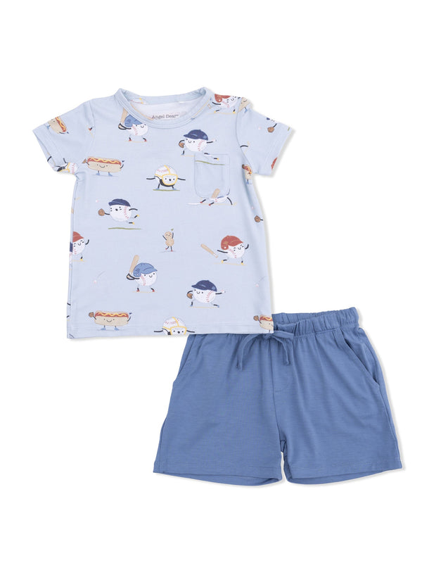 Light blue pajama set featuring fun food characters playing sports, including a shirt and matching shorts.