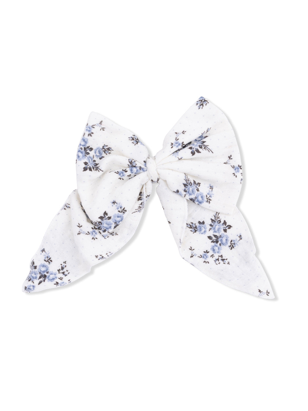 Floral patterned hair bow in white and blue fabric, tied in a large bow shape.