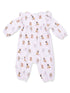 Light pink onesie with various dog prints, featuring long sleeves and ruffle details. Perfect for infants.