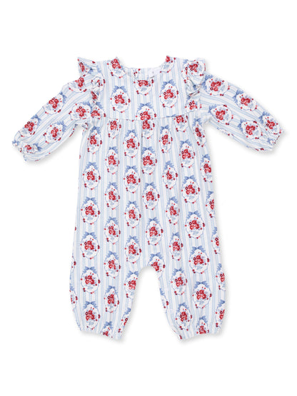 Floral-patterned baby romper with ruffled sleeves and elastic cuffs, set against a striped background.
