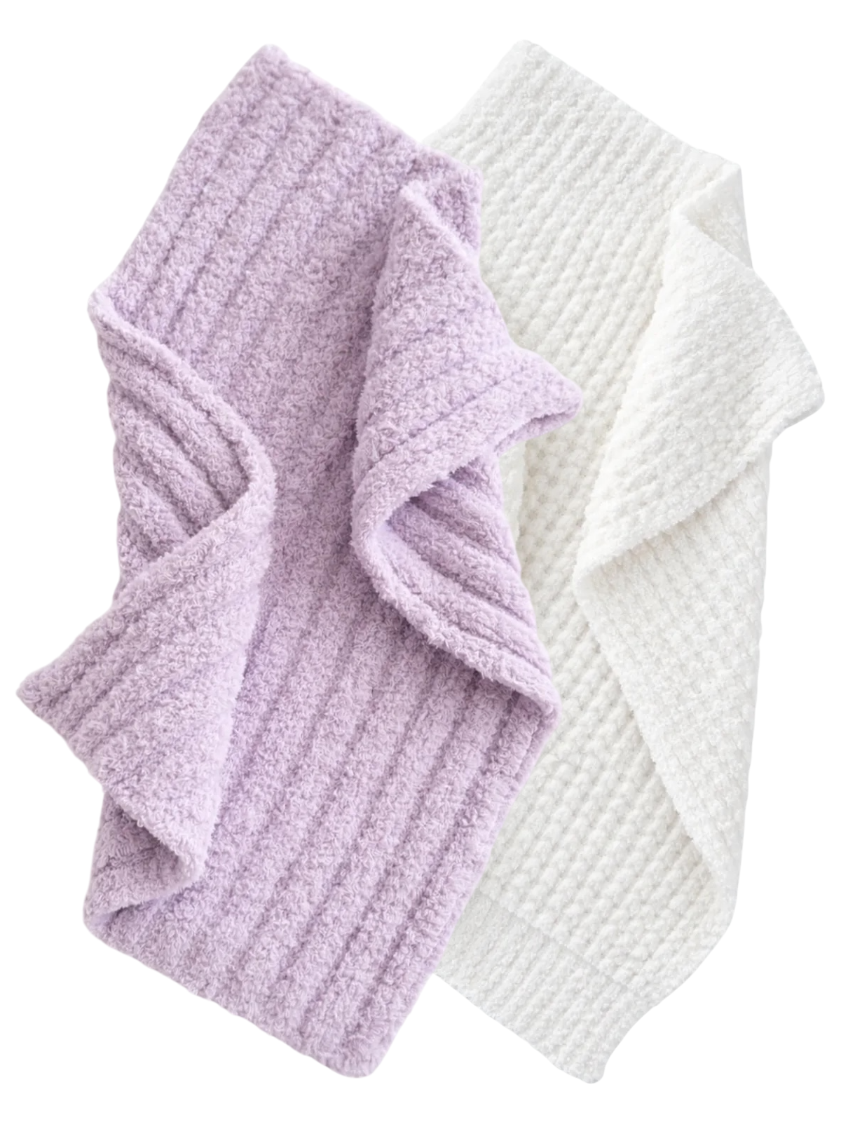 Two cozy towels, one purple and one white, arranged with folds to display their textured patterns.