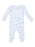 White onesie with blue bows and flowers, featuring long sleeves and footed design.