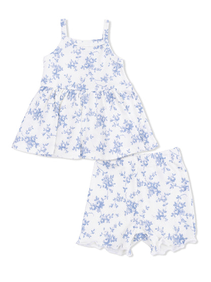 Floral-patterned two-piece outfit with a sleeveless top and matching shorts in white and blue.