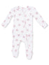 White infant onesie with pink bows and black polka dots, featuring a zip closure and footed design.